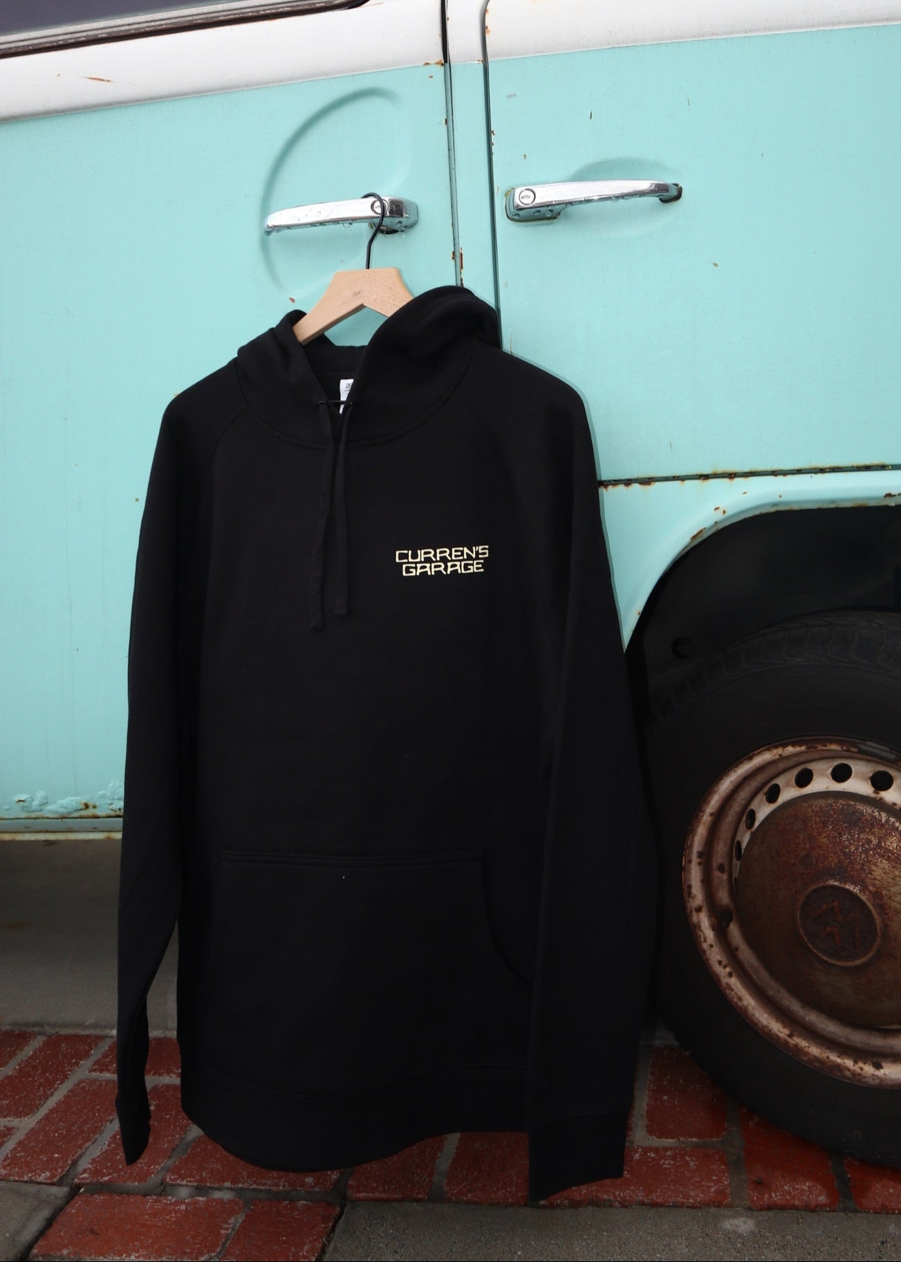 front of black stamp hoodie sweatshirt